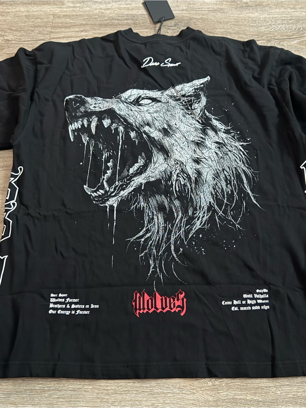 Darc Sport Black Tee with White Wolf Graphic and Red Wolves Text